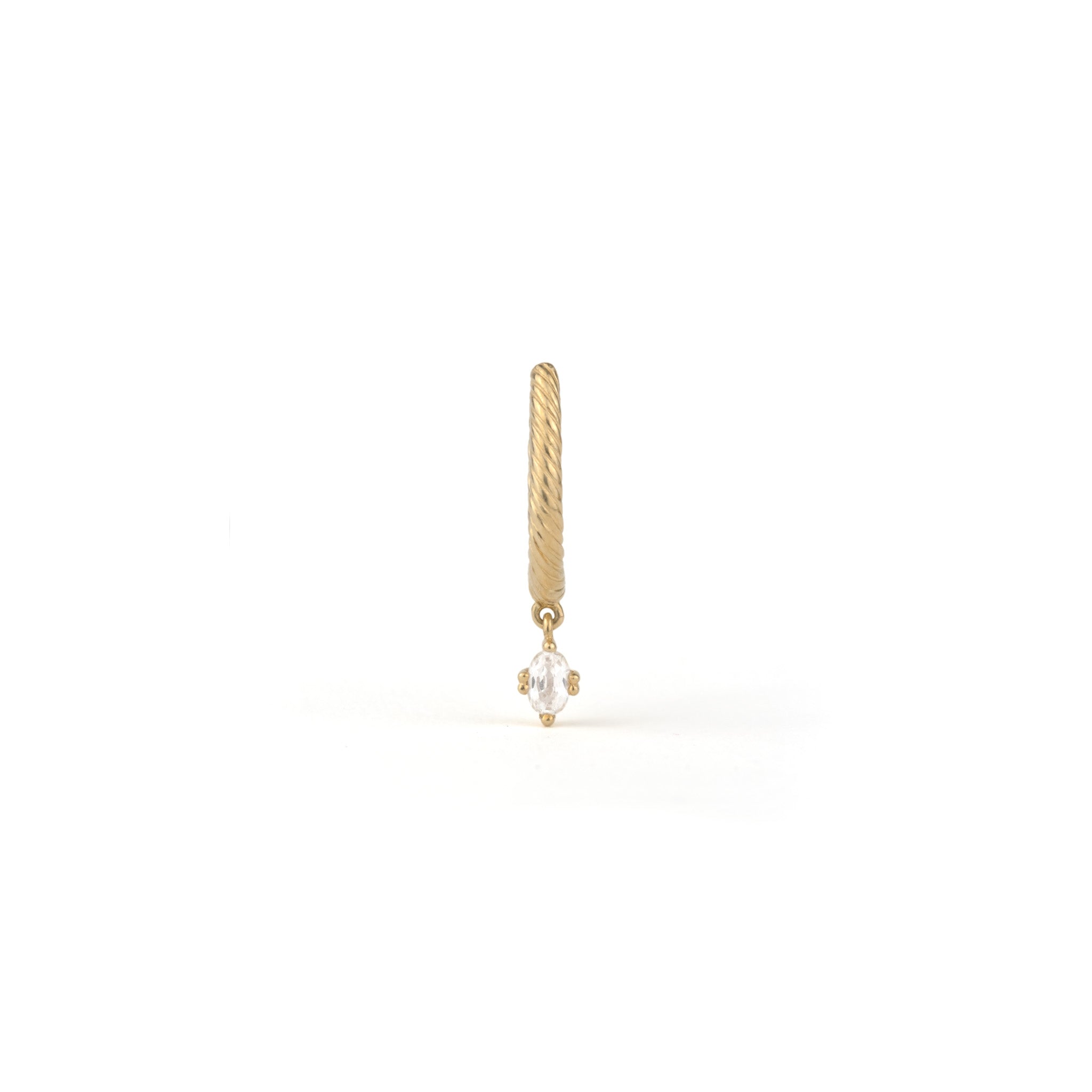 Solid gold huggie hoop earring with twisted texture and dangling oval white sapphire, shown on white background.