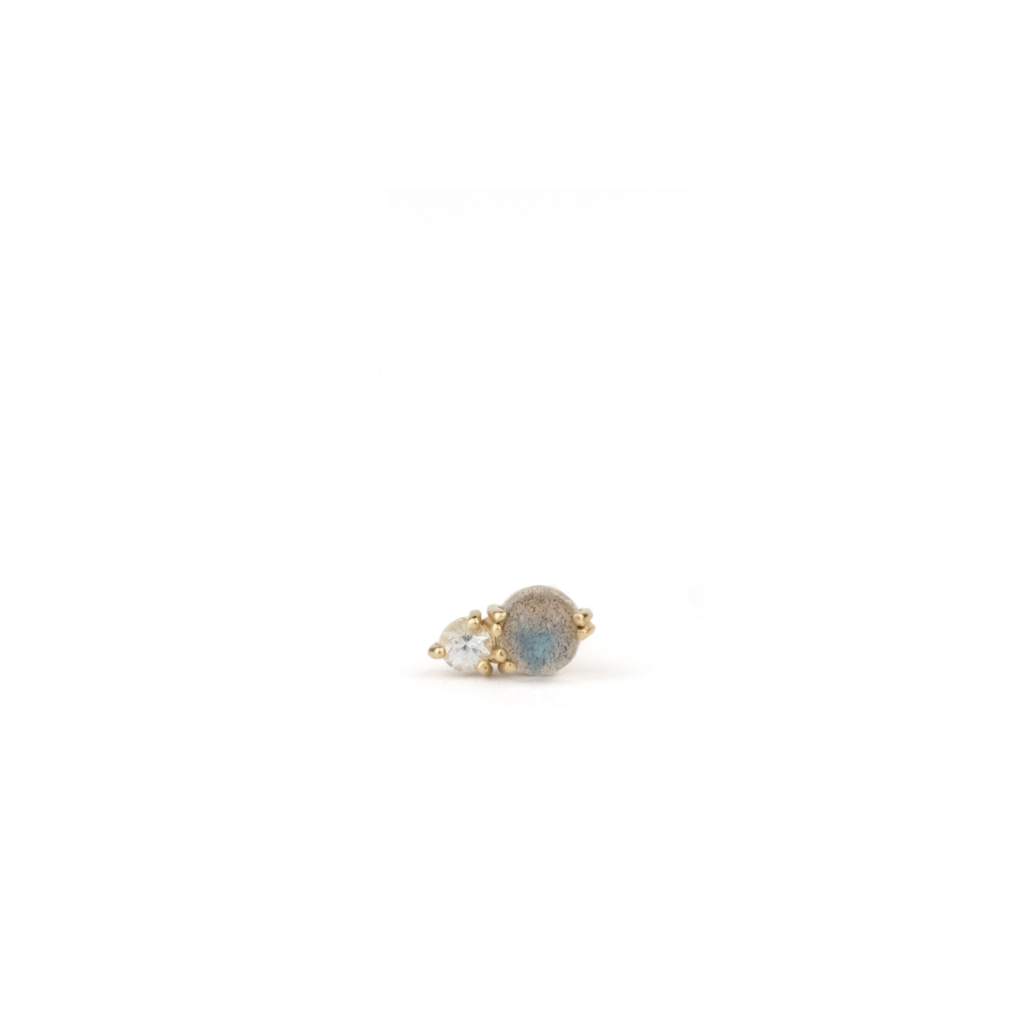 Solid gold stud earring with labradorite and white sapphire in a minimalist design, displayed on white background.