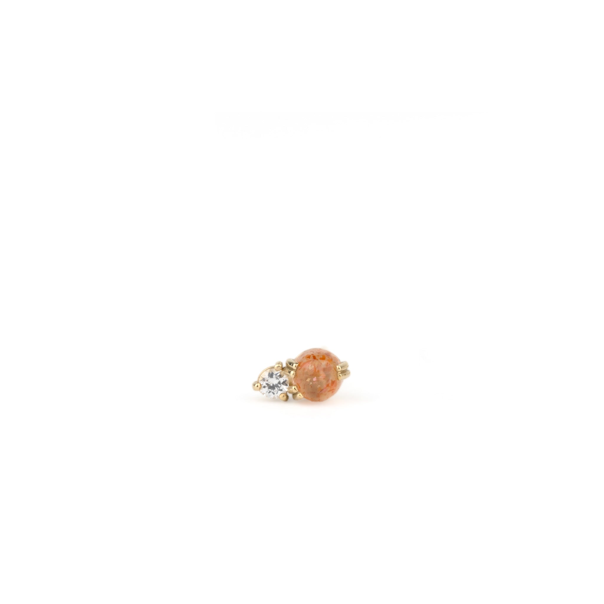 Solid gold stud earring with sunstone and white sapphire gemstones in a minimalist design, displayed on white background.
