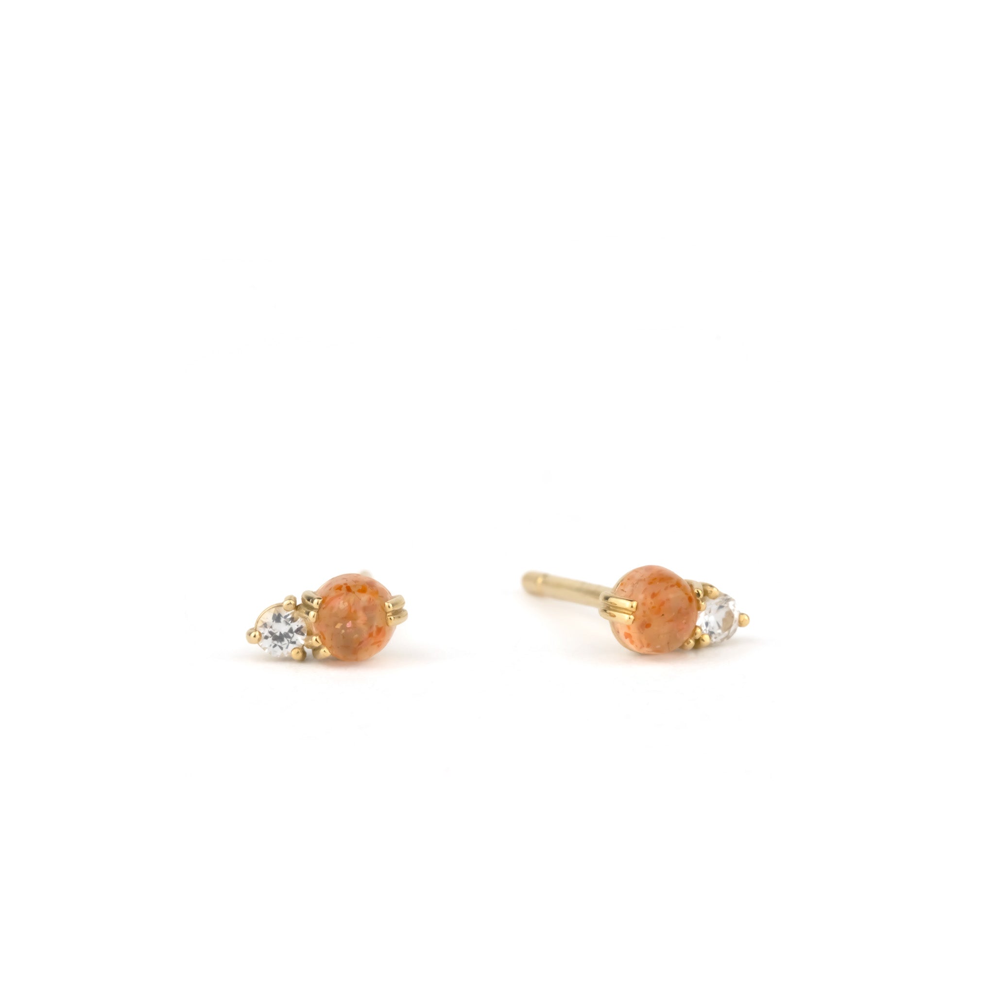 Solid gold stud earrings with sunstone and white sapphire gemstones in a minimalist design, displayed on white background.