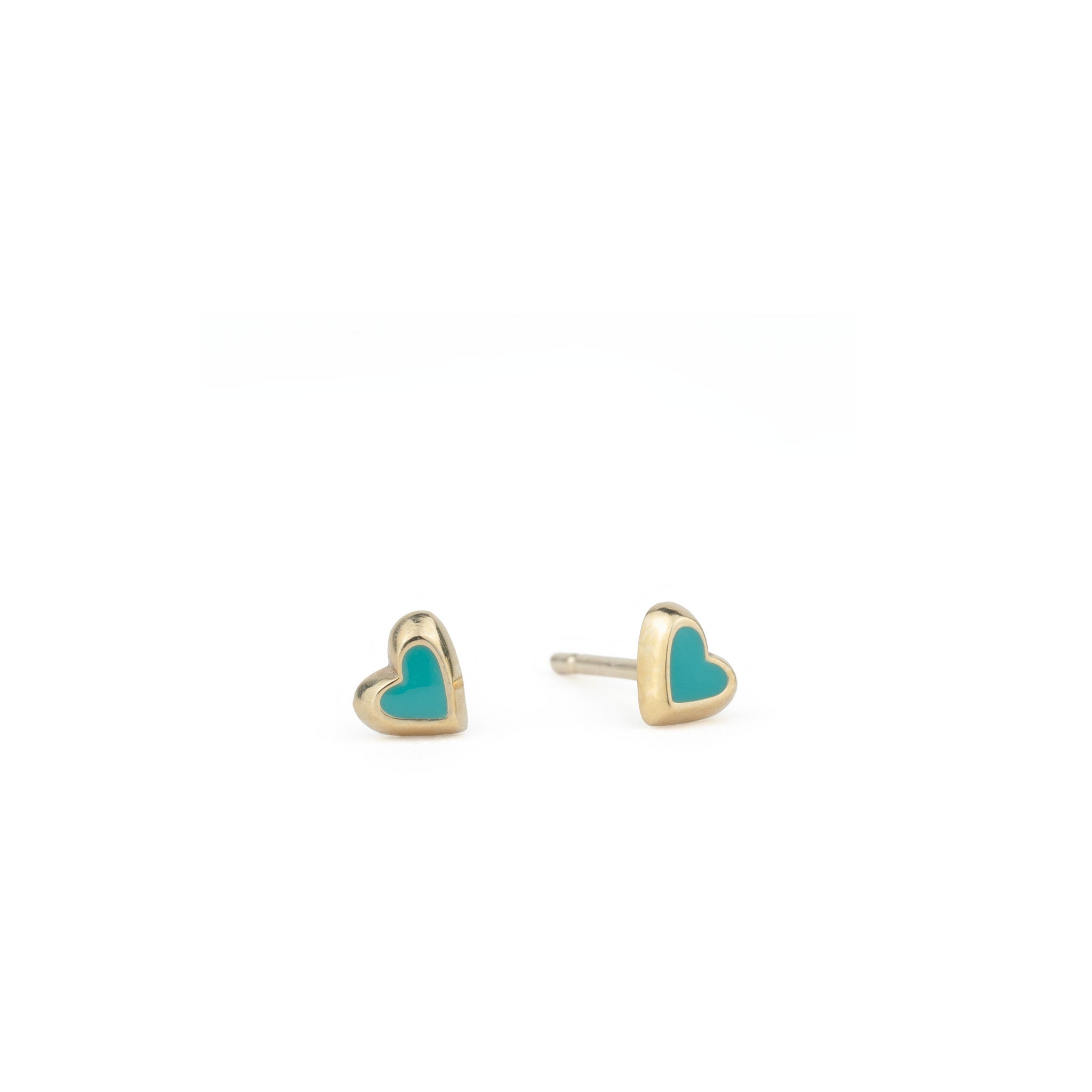 Solid gold tiny heart stud earrings with teal enamel, in a minimalist asymmetrical design, displayed on white background.