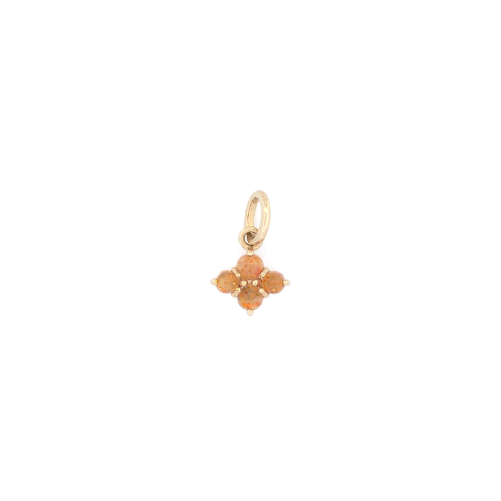 Solid gold small charm pendant with cabochon sunstones, in a minimalist design, displayed on white background.