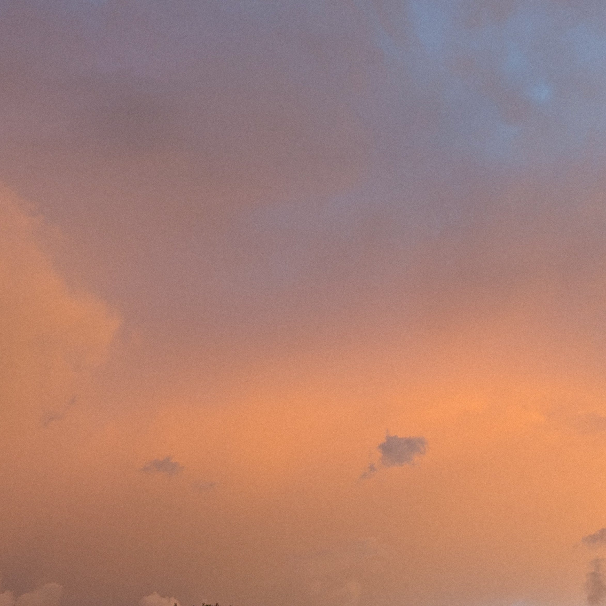 A sunlit sky reflecting on soft clouds, the inspiration behind the Hand-Knotted Sunshower Necklace’s warm sunstone beads and bright orange hemp.