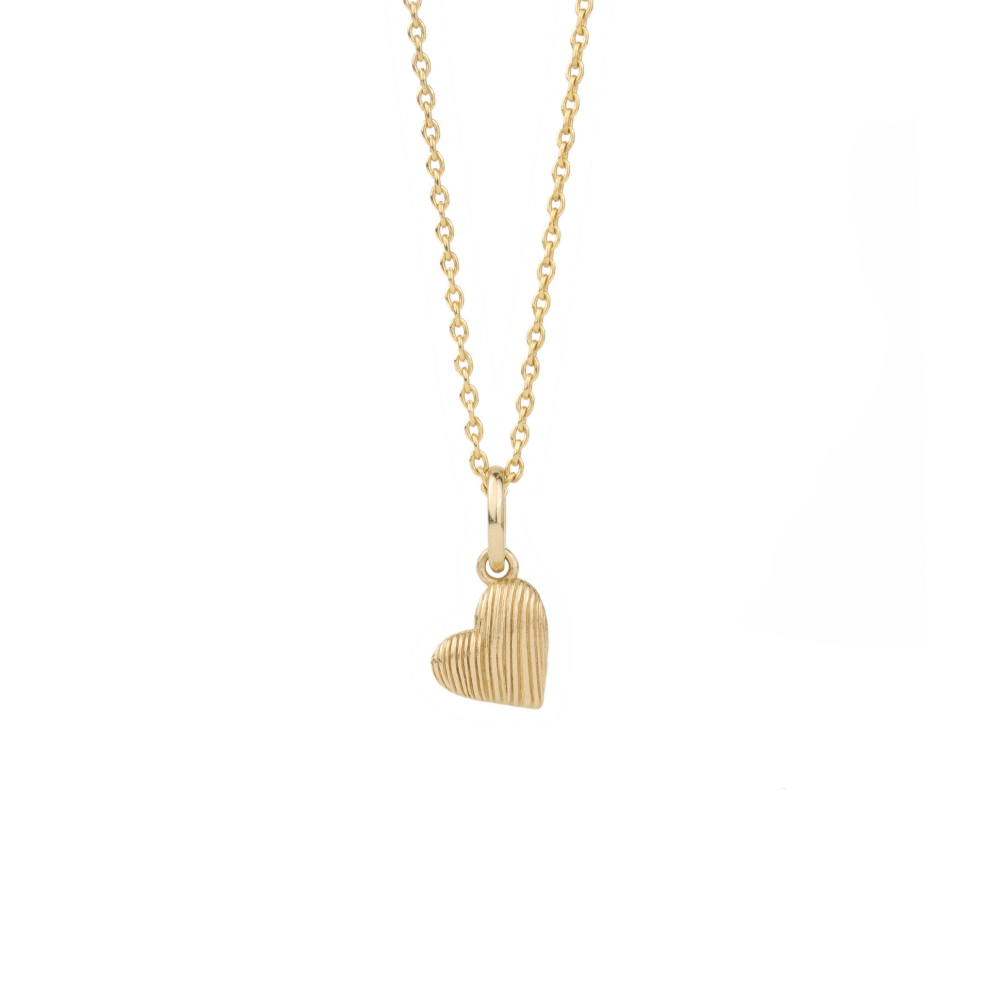 An Aiden Jae Mini Reversible Heart Charm Necklace.