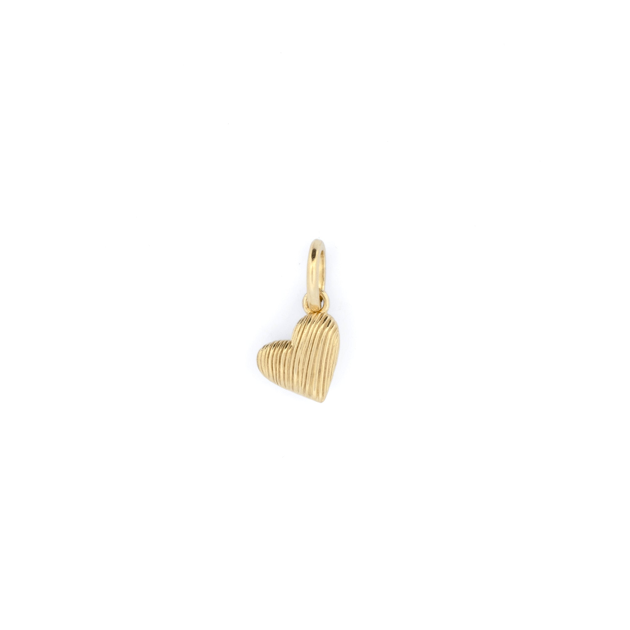 An Aiden Jae Mini Reversible Heart Charm on a white background.