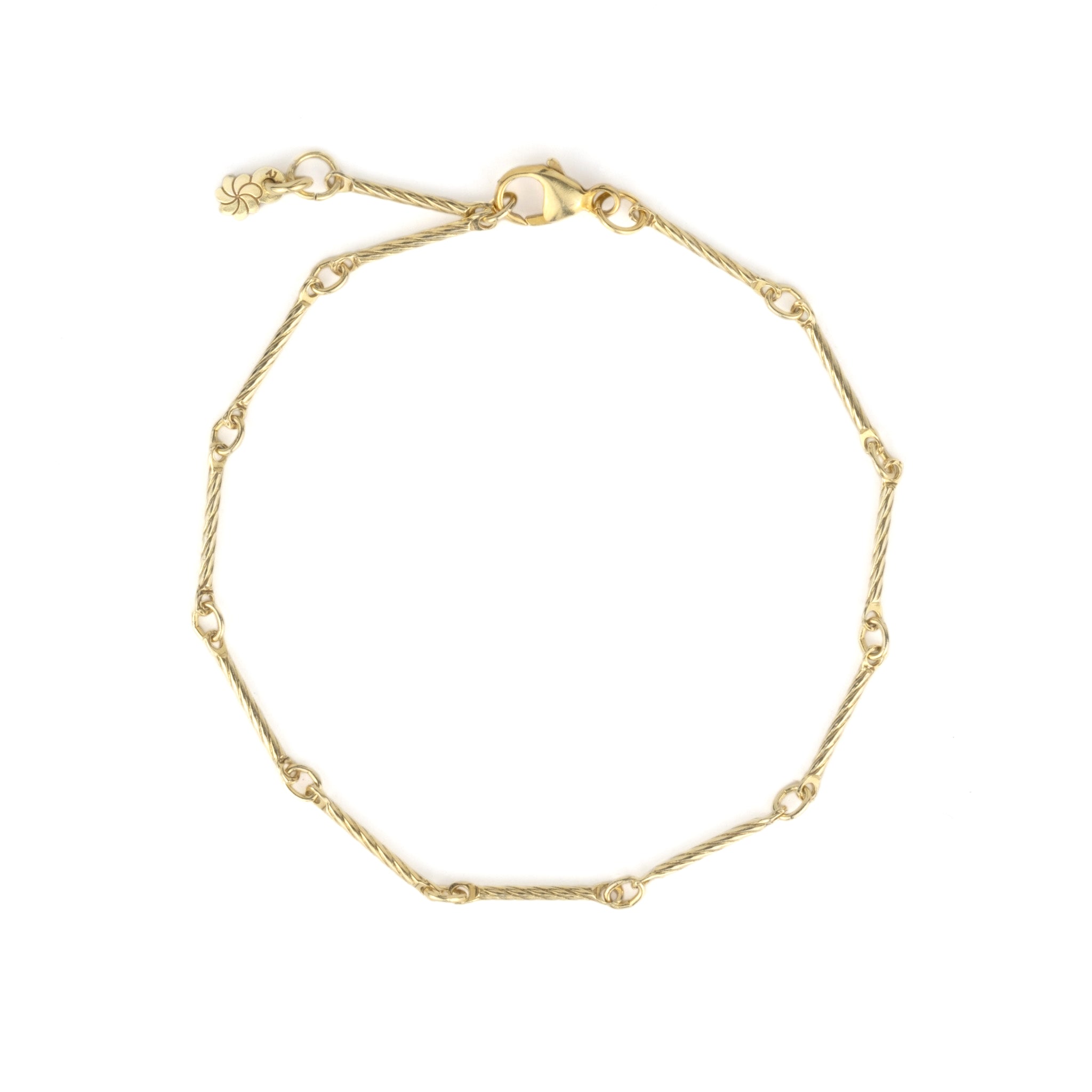 Minimalist solid gold bar chain bracelet with twisted texture, displayed on a white background.