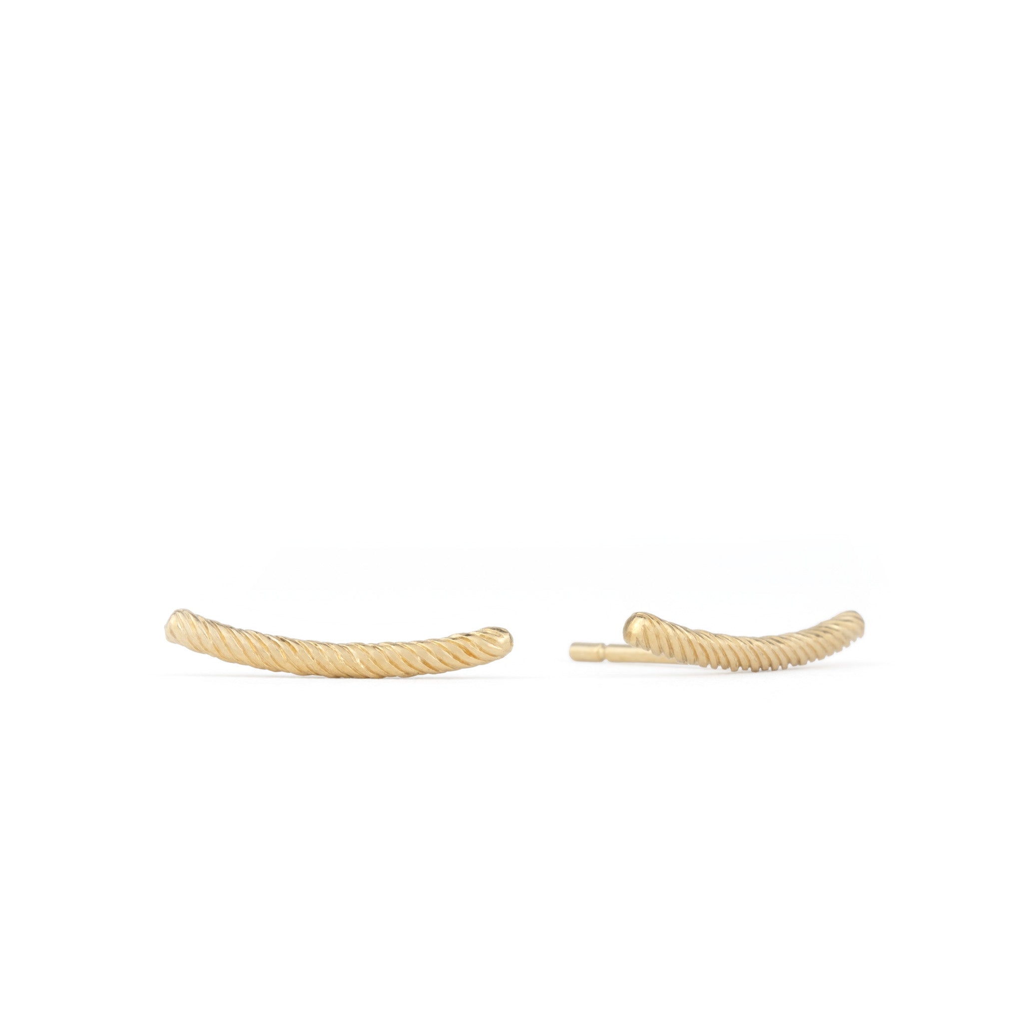 Pair of solid gold bar stud earrings with twisted texture and curved minimalist design, displayed on a white background.